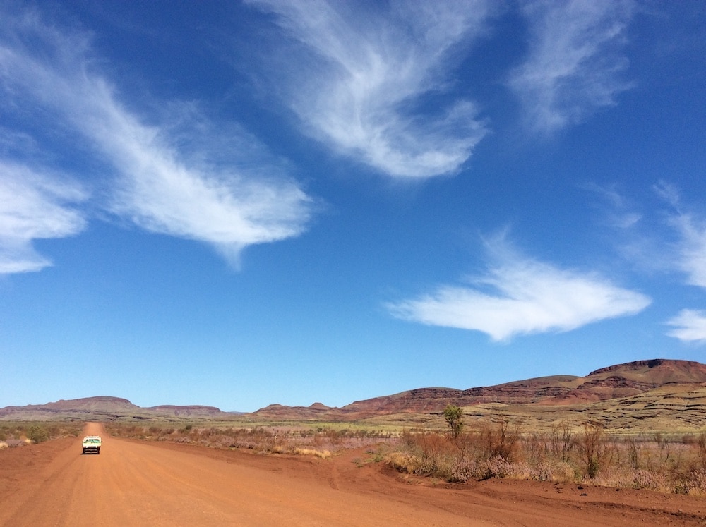 Photo of a car driving through the Australian outback | Featured Image for Next-Gen DNA Sequencing for Improved Environmental Impact Assessments Blog Page by TERN.