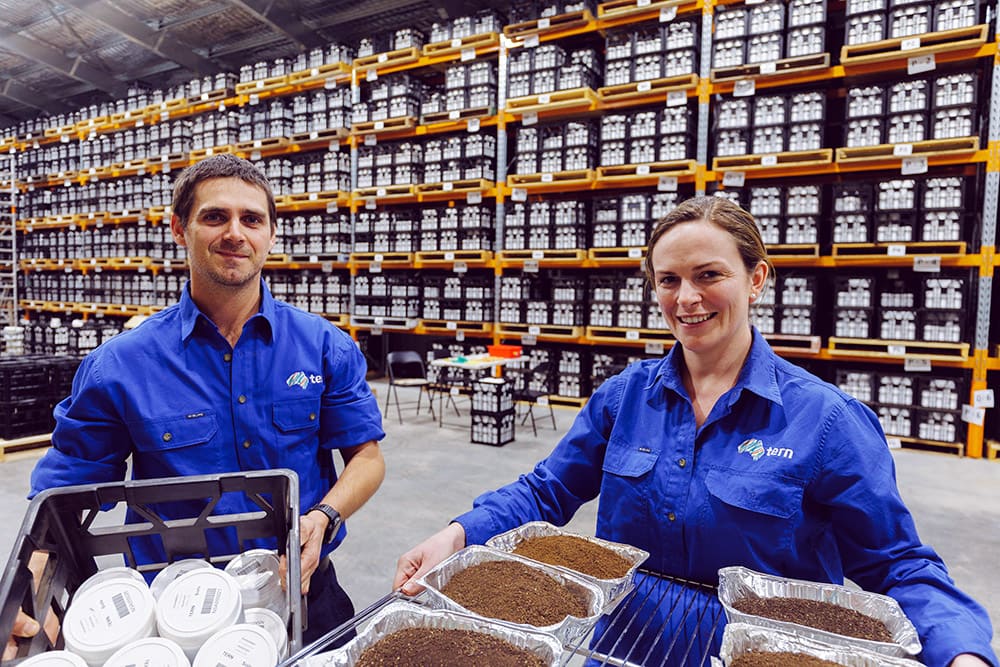 Luke Finn and Nikki Francis Martin holding soil samples | Featured Image for Australian Ecological Treasure - New National Facility Opens page by TERN.